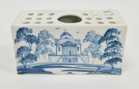 Isis Pottery Delft-style flower-brick of rectangular form, painted with neo-classical buildings in