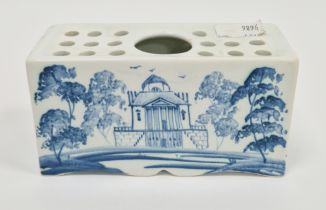 Isis Pottery Delft-style flower-brick of rectangular form, painted with neo-classical buildings in