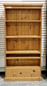 Modern pine tall bookcase with four adjustable shelves, drawer below, on plinth base, 183cm high x