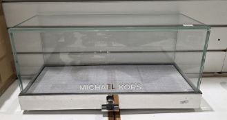 Contemporary Michael Kors counter top shop display cabinet of rectangular form, comprising five