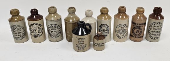 Collection of early 20th century stoneware ginger beer bottles, including: Dales & Son,
