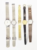 Two Skagen stainless steel wristwatches, one numbered SKW2075, together with an early 20th century