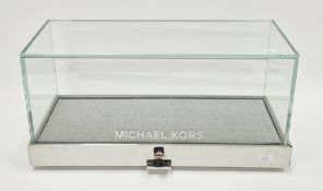 Contemporary Michael Kors counter top shop display cabinet of rectangular form, comprising five