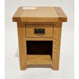 Contemporary oak bedside table of square section with frieze drawer