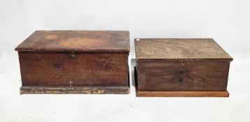 Two 19th century pine blanket boxes, both with hinged lids, on plinth bases, the largest with iron