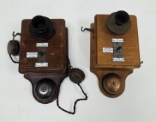 Two Early 20th century wall-mounted railway signal box telephones, both in oak cases with bakelite