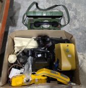 Box of vintage telephones including three black bakelite desk phones, military field telephone