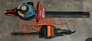 Makita model HTV7600 hedge trimmer together with a Black and Decker 41cm GP251 electric hedge
