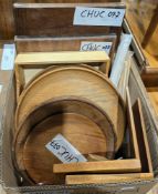 Box of treen including serving dishes, bookends, trays, chopping board, a table-top bookshelf and