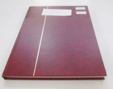 Br Empire and Commonwealth Stamps: Maroon A4 stock-book of mint and used QV-QEII definitives and