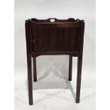 George III mahogany nightstand of square form, the tray top with pierced handles, over a pot