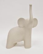 Lineasette slip cast porcelain model of a stylised elephant, modelled standing with its trunk