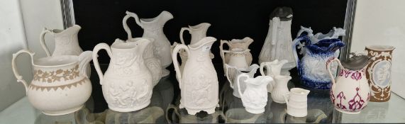 Collection of Victorian pottery relief moulded jugs including Parian examples by Royal Worcester, TR