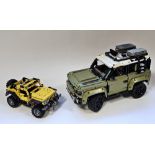 Lego Technic Land Rover Defender no.42110  together with a Jeep Wrangler no. 42122 both models built