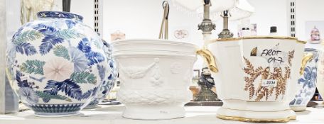 Pair of Japanese ceramic bulbous vases decorated with flowers, 28cm high together with four