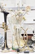 Large glass vase with fluted rim, containing various dried flowers, a black vase in the pulpit-