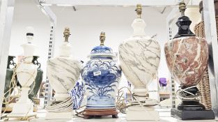Three Searchlight marble-effect ceramic table lamps, tallest 57cm high, a blue and white ceramic