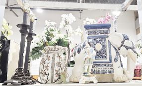 Ceramic seat in the form of a chinese elephant, 44cm high, a pair of black metal table lamps, 54cm