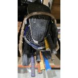 Collection of approx 13 tennis rackets including Head, Destiny, Mizuno and others, in a wicker