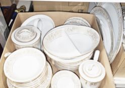 Noritake Raphael part dinner service having a gilt pattern on a white ground, including serving