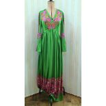 1970's polyester maxi dress, green with paisley style pattern to the 'V' necked bodice and angel