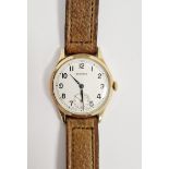 Gent's Garrard 9ct gold strap watch, the circular dial with subsidiary seconds dial, on brown