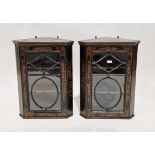 Pair of black lacquered hanging corner cabinets in the George III manner, having chinoiserie