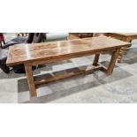 Modern refectory-style dining table, the elm two plank top with cleated ends, on square chamfered