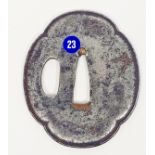 Japanese sword guard (Tsuba), Edo period, polished, with two apertures, decorated with stylised