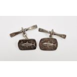 Pair of Scottish silver cufflinks by Malcolm Appleby, of oval design decorated in relief with a fish