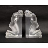 Pair of Lalique frosted glass Reverie bookends, etched Lalique France marks to one, each modelled as