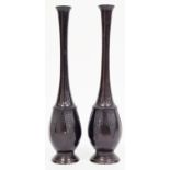 Pair of Japanese Meiji period bronze tall slender oviform vases, each with flared neck, case with