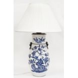 Chinese Qing dynasty blue and white crackle glaze baluster vase, with simulated bronze lion dog ring
