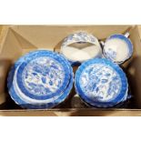 Blue and white willow pattern part tea set comprising cake plates, saucers, sugar bowl etc.