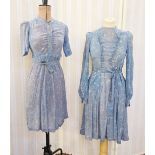 Various vintage dresses, blue flower printed 1940's dress, front pockets, ruffled front to the