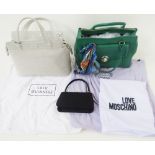Lulu Guinness patent leather handbag, zip fastening with 'lipstick' charms on the two way zip, inner