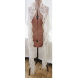 Quantity of undyed lace to include a shawl, trimmings, and a large veil which is damaged (1 bag)