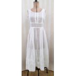 Two Victorian petticoats, one heavily embroidered in whitework daisies and knot decoration, and
