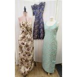 1960's brocade evening dress, raised gold coloured decoration on turquoise ground, size 14, a