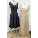Black moire silk dress with a label 'Hardy Amies', empire line, a full stiffened skirt, ballerina