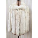 A vintage blue fox fur jacket with its original bill of sale from Furs International Bournemouth,