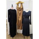 A bronze coloured raw silk full length evening dress, with draped bodice, strapless, with a matching