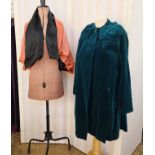 A 1920's pale orange satin evening cape, with devore cut velvet pattern to the back, black buttons