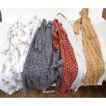 Three printed Indian cotton dresses, a white nylon chiffon dress labelled 'Parigi', labelled size