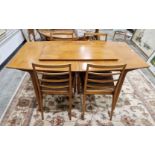 Mid-century A.H. McIntosh of Kirkcaldy teak dining room table and four chairs, Dunvegan range, the