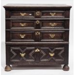 17th / early 18th-century oak chest of drawers, the rectangular top with thumb-moulded edge over a