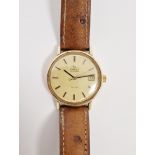 Omega De Ville automatic gentleman's gold wristwatch, the gilt dial with raised baton hour