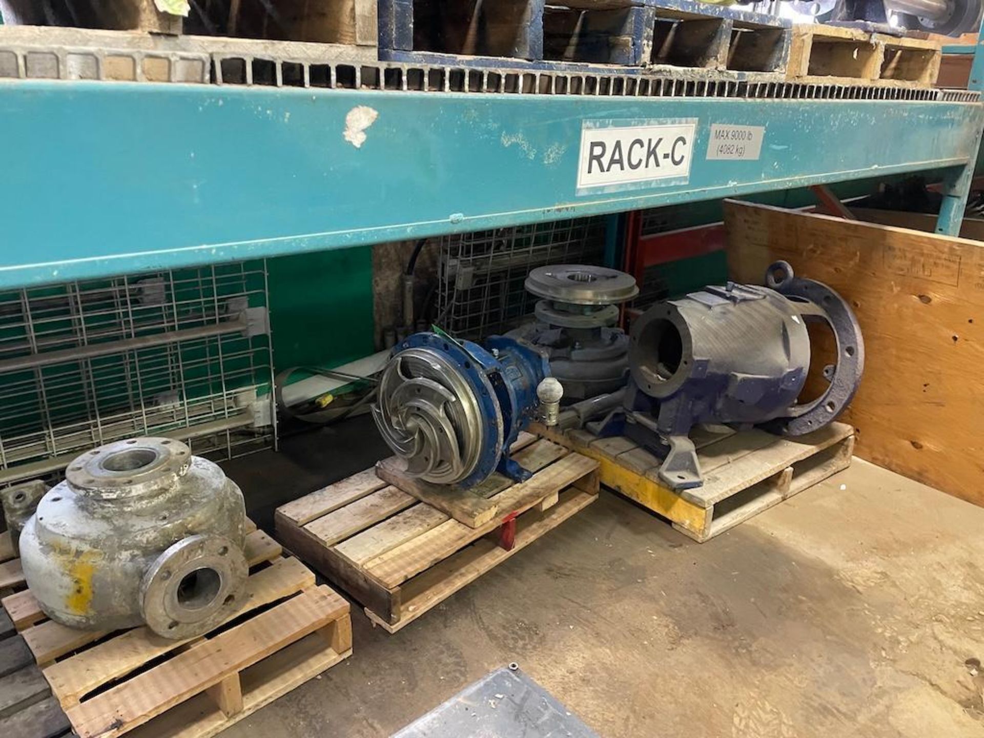 Motor Racking Buster LOT SECTION OF RACKING AND PALLETS W ASSORTED PUMP, MOTOR PARTS, PIECES ...