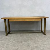 A vintage limed oak side or console table with thick plank top over two frieze drawers raised on