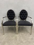 A pair of Eichholtz dining chairs each with circular deep buttoned back and shaped polished chrome